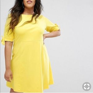 Yellow dress with tie sleeves